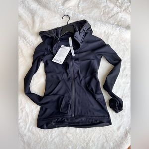 Lulu lemon FAR AND FREE jacket, new with tag size 4 with foldable hoodie